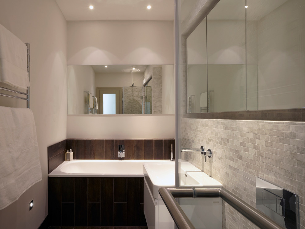 Design ideas for a contemporary master bathroom in London with a console sink, a corner shower, a wall-mount toilet, mosaic tile and ceramic floors.