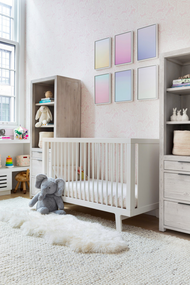 Inspiration for a large contemporary kids' room for girls in New York with white walls, light hardwood floors and brown floor.