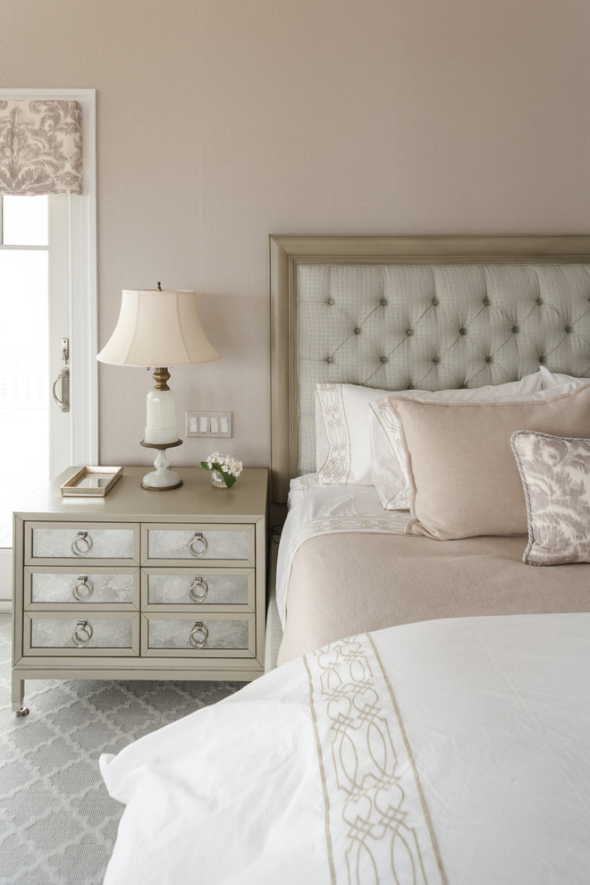Example of a transitional master carpeted bedroom design in New York with gray walls