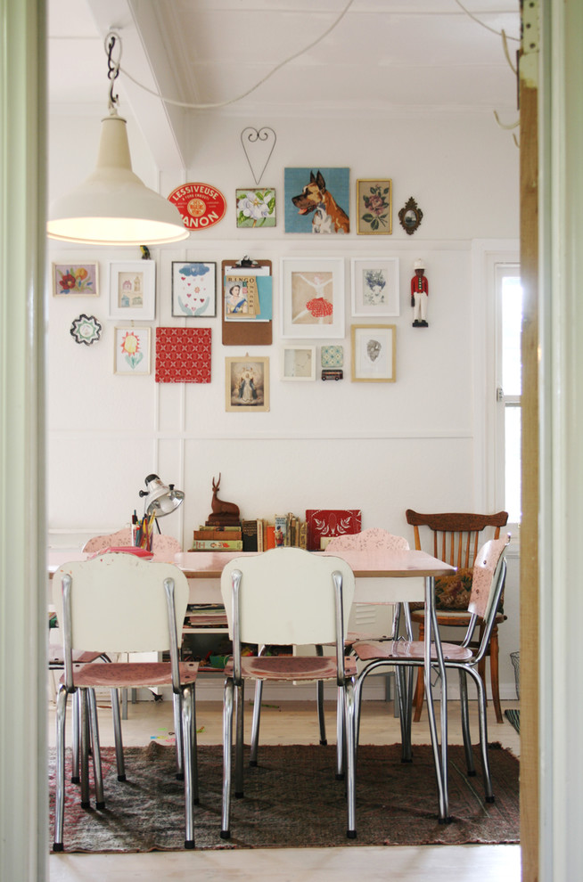 Enclosed dining room - shabby-chic style enclosed dining room idea in Melbourne with white walls