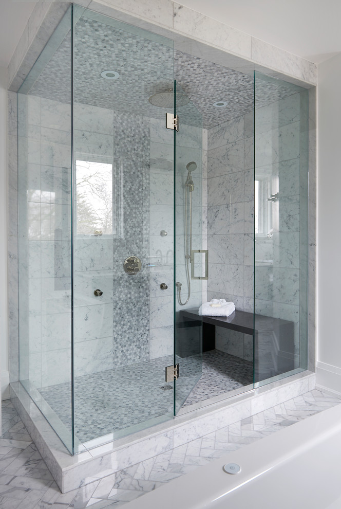 This is an example of a large contemporary master bathroom in Toronto with flat-panel cabinets, grey cabinets, a freestanding tub, white tile, marble, white walls, marble floors, a vessel sink, engineered quartz benchtops and a corner shower.