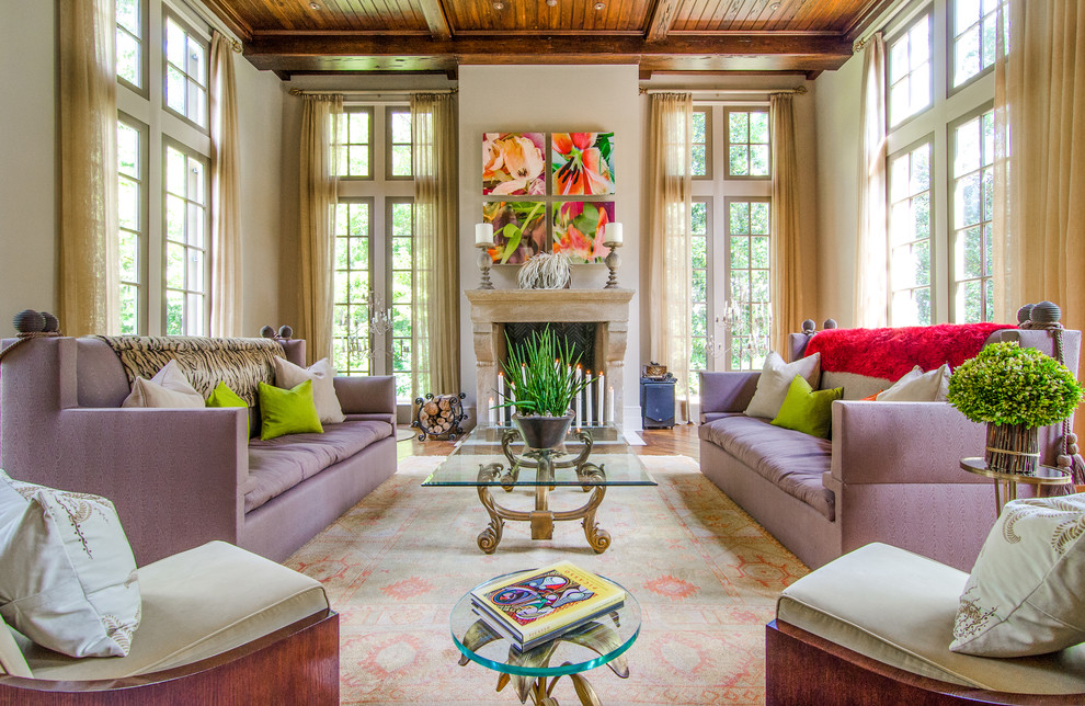 This is an example of an expansive transitional living room in Atlanta with beige walls.