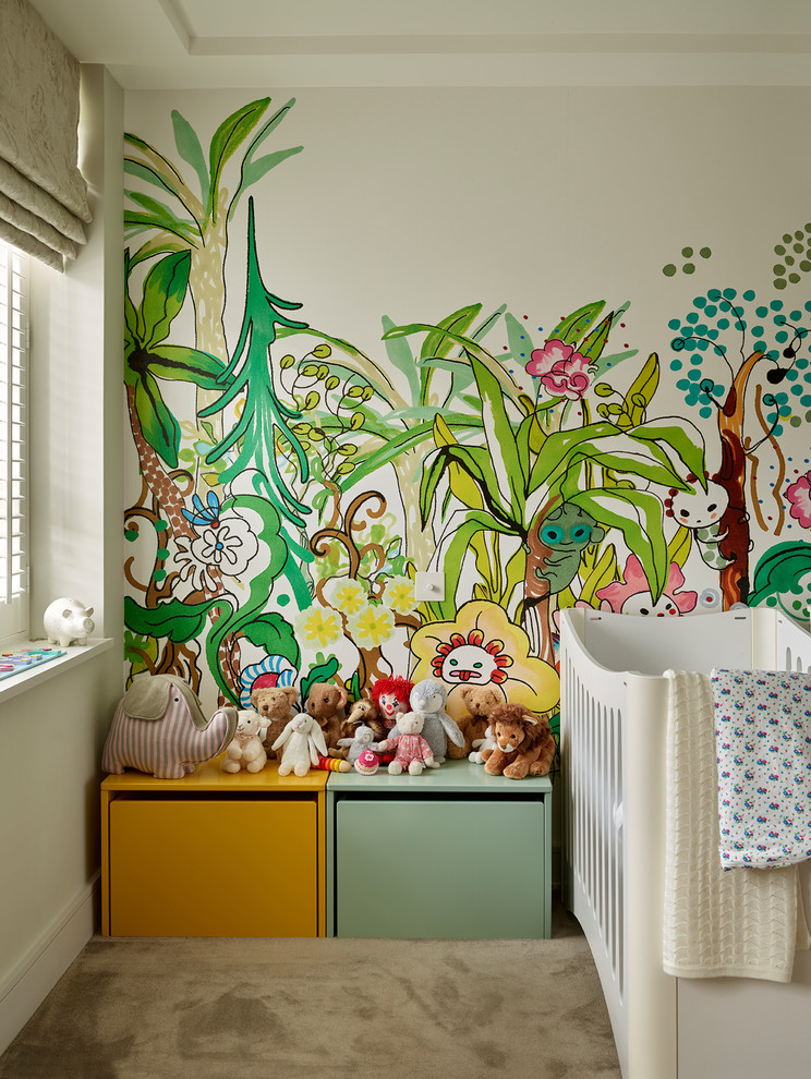 Contemporary gender-neutral nursery in London with carpet, beige walls and brown floor.