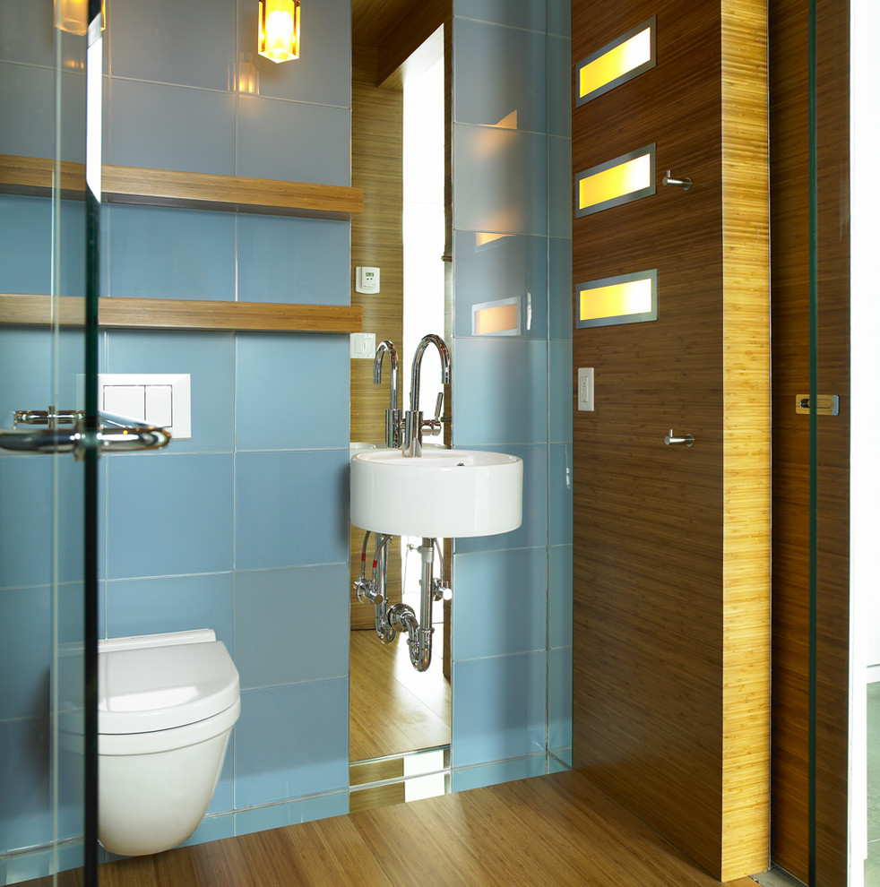 Photo of a contemporary bathroom in Vancouver with a wall-mount sink and a wall-mount toilet.