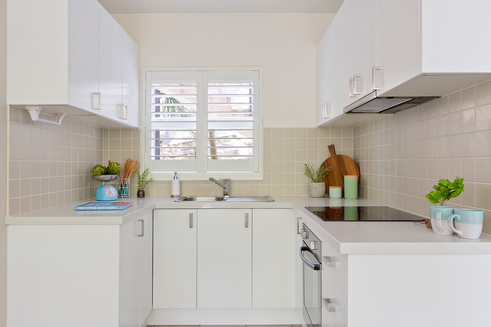 Inspiration for a small transitional kitchen in Sydney.