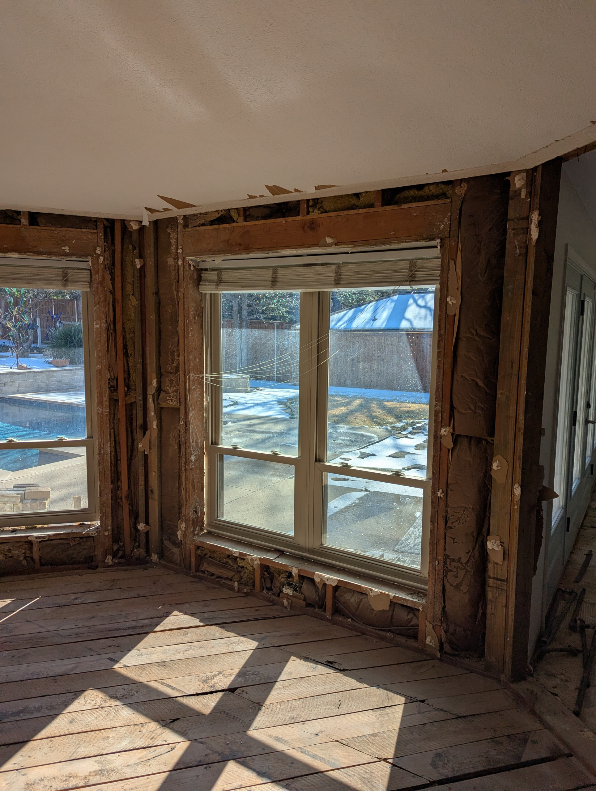This area will have sliding glass panels when we are finished. Window Perimeter : Weatherproofing - Envelope Examining the window headers and framing. This stage is critical for identifying any histor