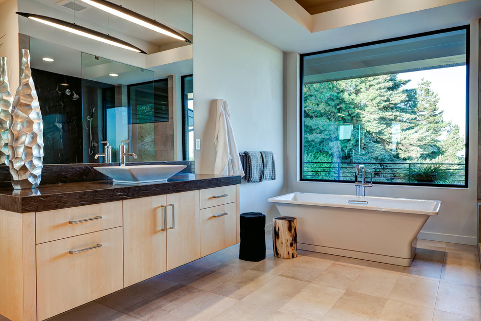 Photo of an expansive contemporary master bathroom in Portland with flat-panel cabinets, beige walls, ceramic floors and a vessel sink.