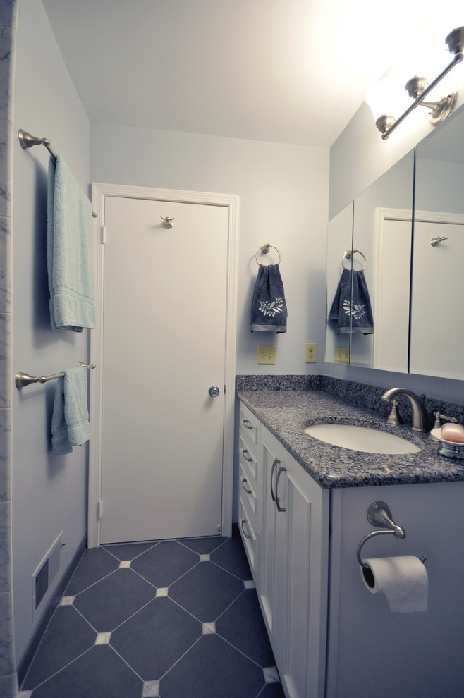 Mid-sized transitional master white tile and stone tile ceramic tile alcove bathtub photo with white cabinets, an undermount sink, granite countertops, louvered cabinets, a two-piece toilet and purple walls