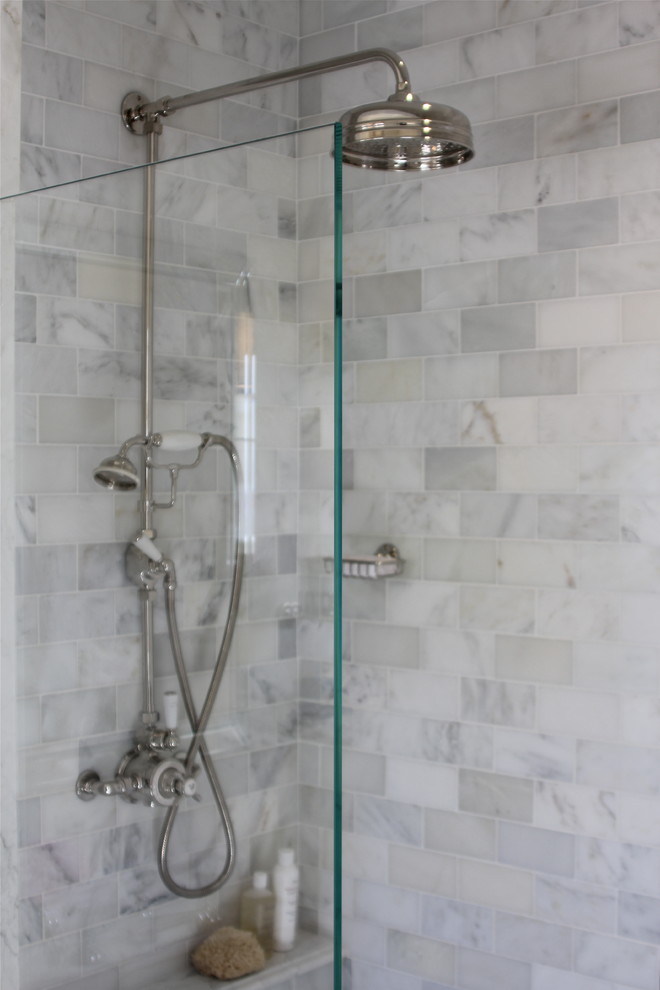 This is an example of a contemporary bathroom in San Francisco with subway tile.
