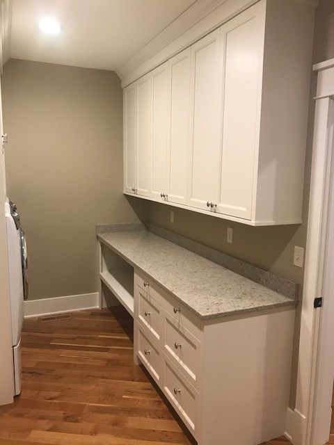 Inspiration for a transitional laundry room remodel in Cedar Rapids