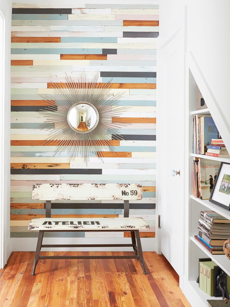 Inspiration for a contemporary entryway in Austin with multi-coloured walls, medium hardwood floors, a single front door and a white front door.