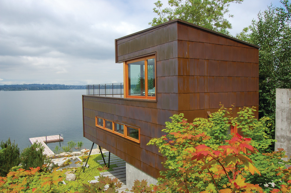 Design ideas for a large contemporary two-storey exterior in Seattle with metal siding.