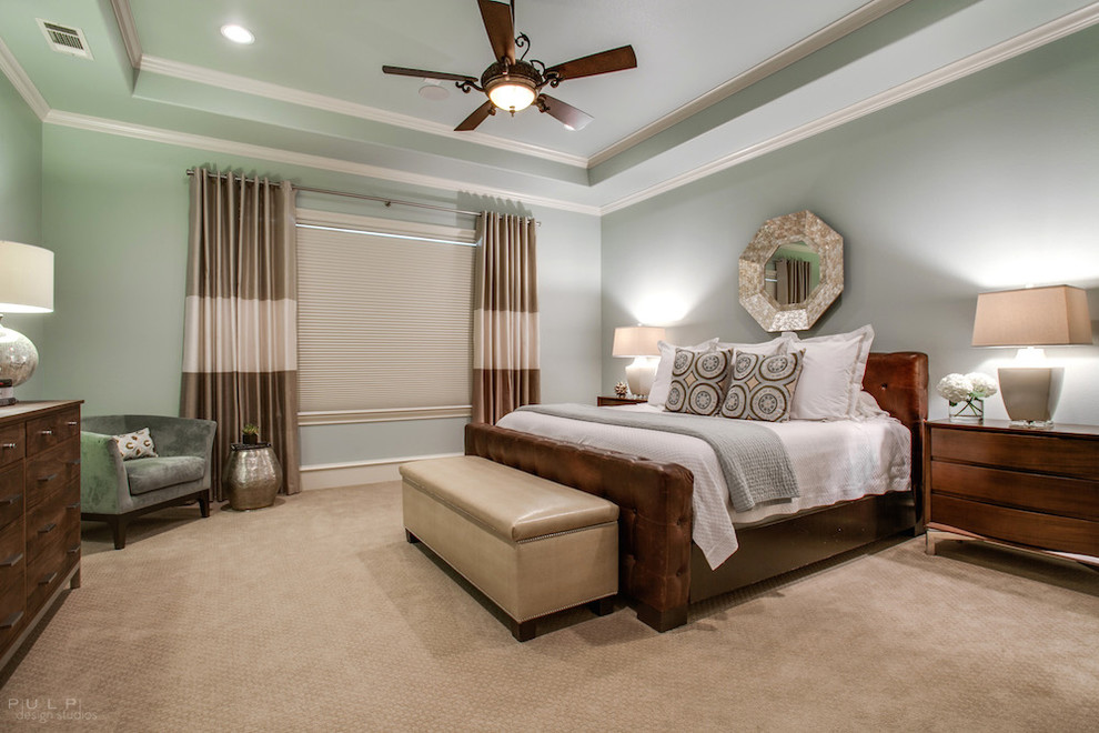 Large transitional master bedroom in Dallas with blue walls, carpet and no fireplace.