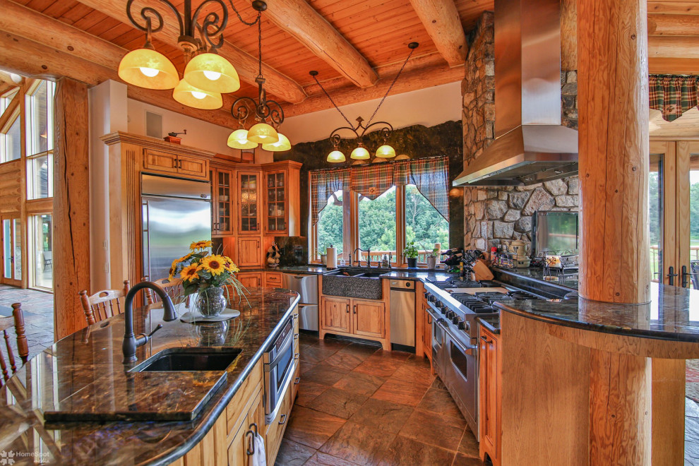 Example of a large mountain style kitchen design in Philadelphia with an island
