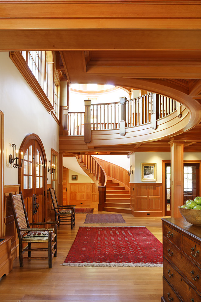 Photo of an expansive traditional foyer in Boston with medium hardwood floors.