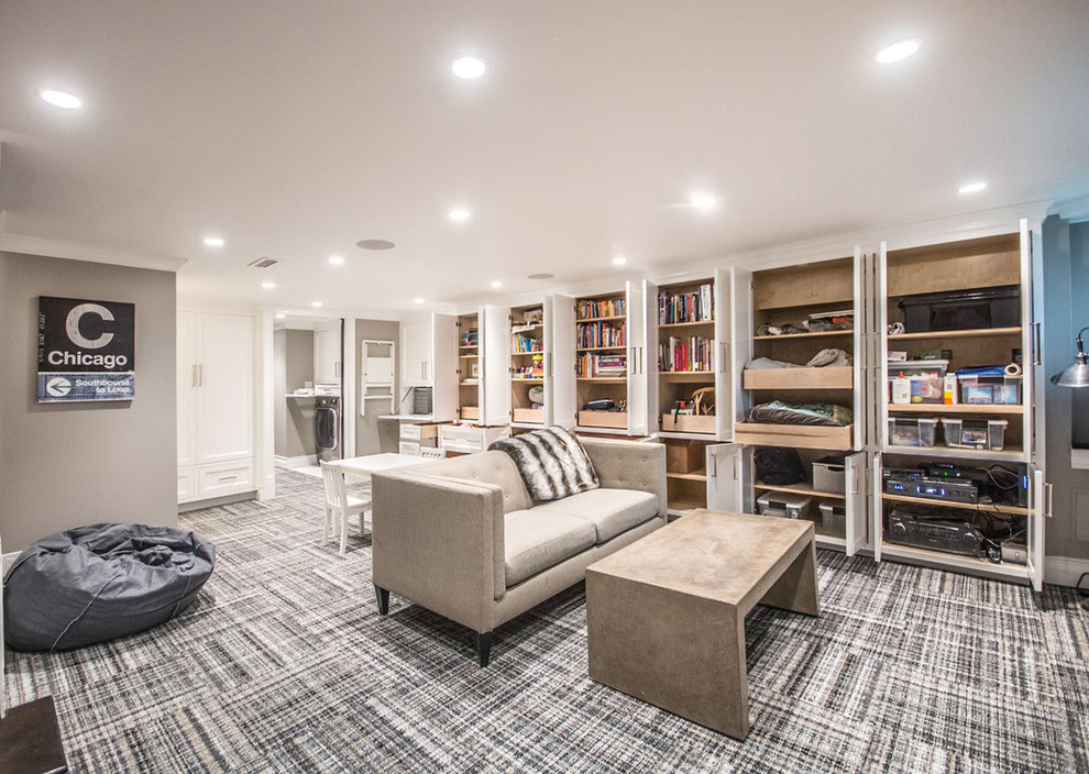 Inspiration for a large transitional carpeted basement remodel in Chicago with beige walls