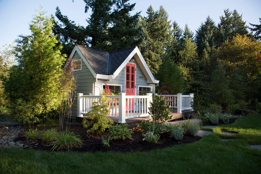 This is an example of a small traditional garden in Portland with with outdoor playset.