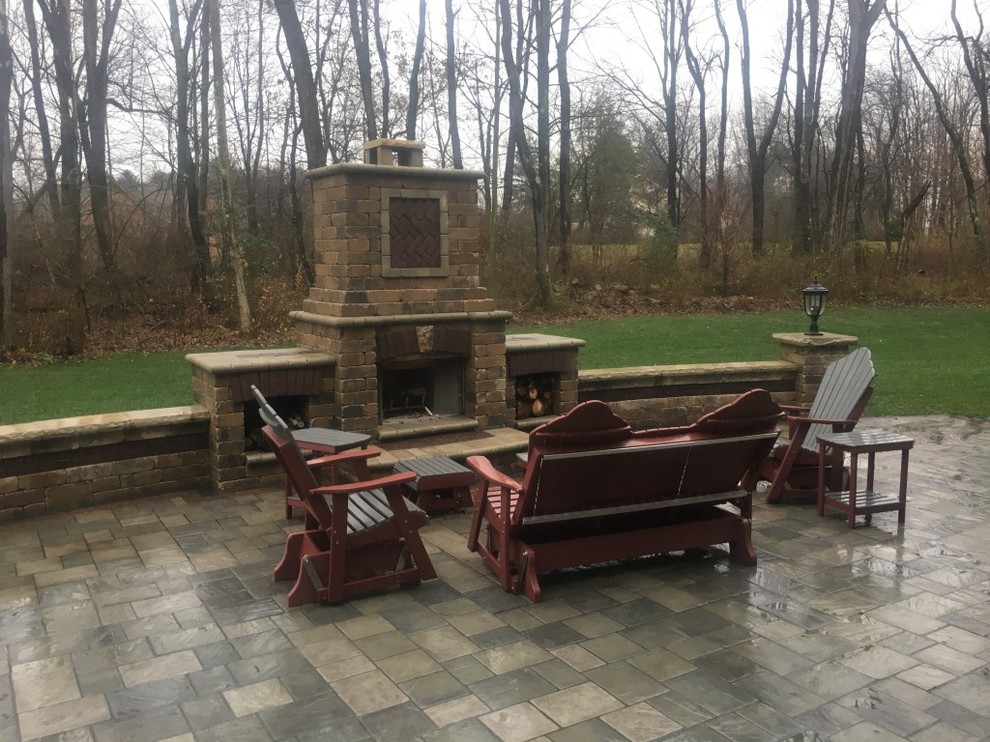 Small transitional backyard brick patio photo with no cover