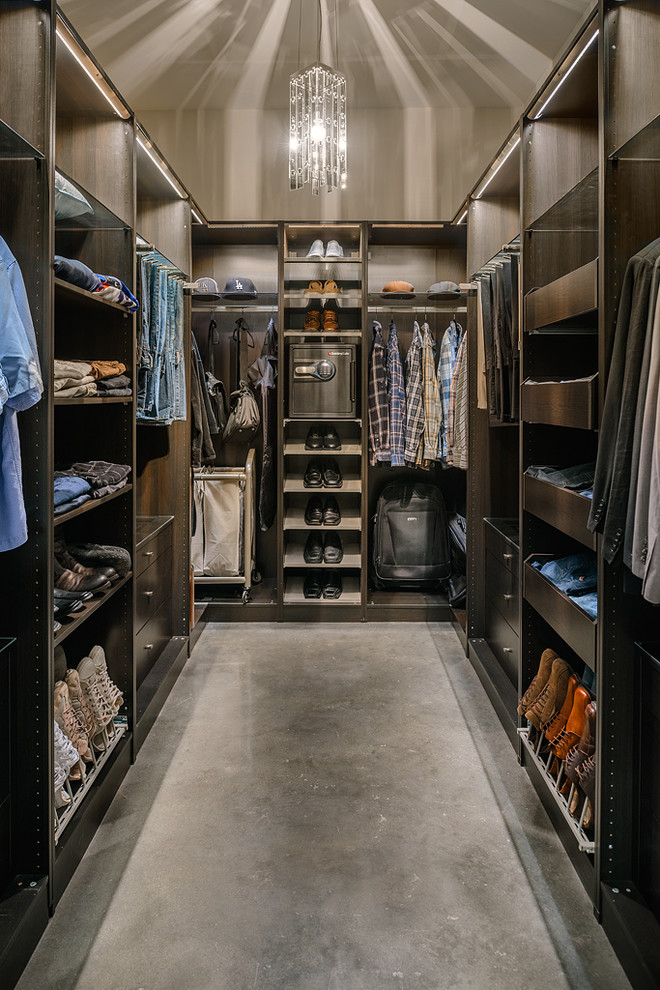 Inspiration for a contemporary men's dressing room in Vancouver with concrete floors.