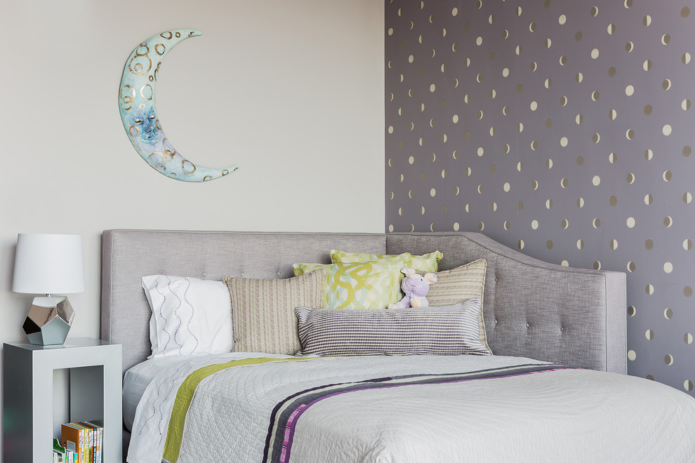 This is an example of a mid-sized transitional kids' room for girls in Boston with grey walls.