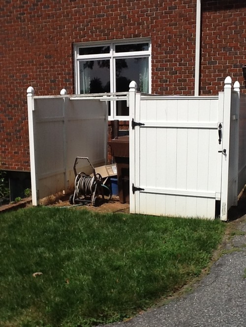 Traditional fence to hide outdoor trash cans? - 