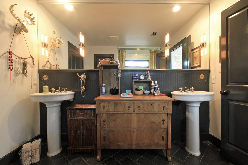 Inspiration for an arts and crafts master bathroom in Houston with black tile, stone tile, white walls, slate floors and a pedestal sink.
