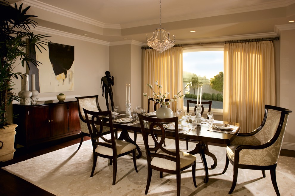 Design ideas for a traditional dining room in Los Angeles with beige walls and dark hardwood floors.