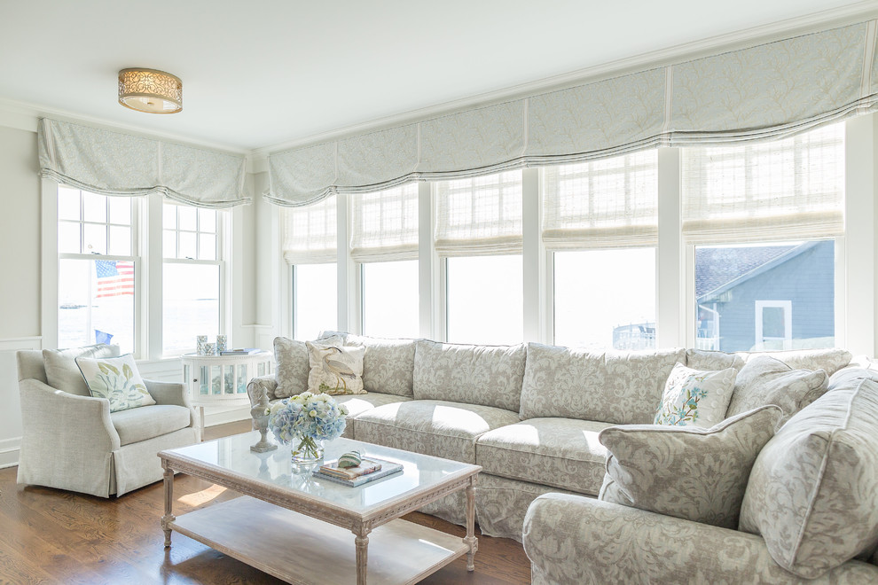 Photo of a mid-sized beach style sunroom in Other with dark hardwood floors, a standard ceiling and brown floor.