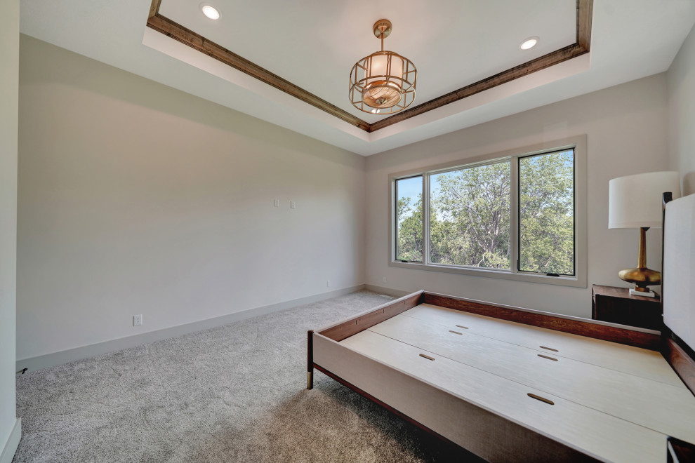 Example of a transitional home design design in Omaha