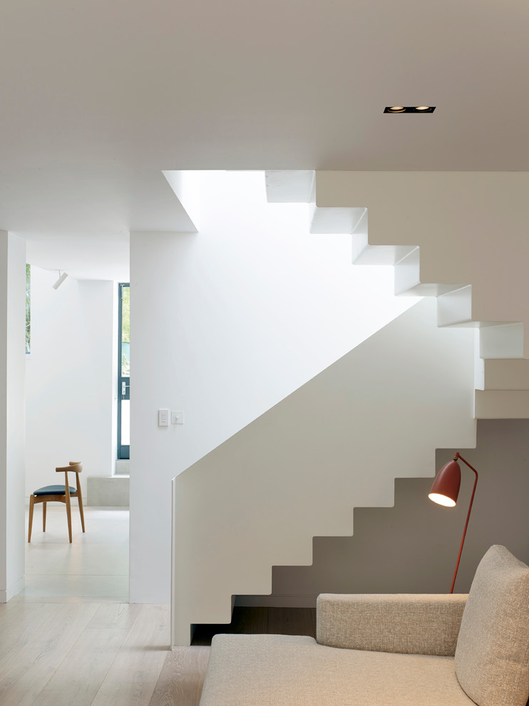 This is an example of a scandinavian curved staircase in London.