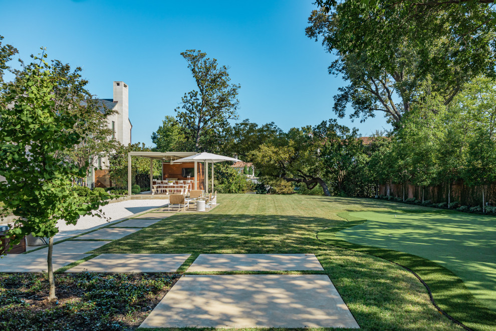 Inspiration for a modern back garden in Dallas with concrete paving.
