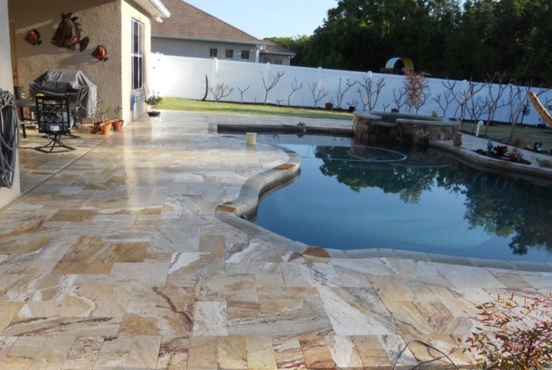 Hot tub - backyard custom-shaped hot tub idea in Phoenix