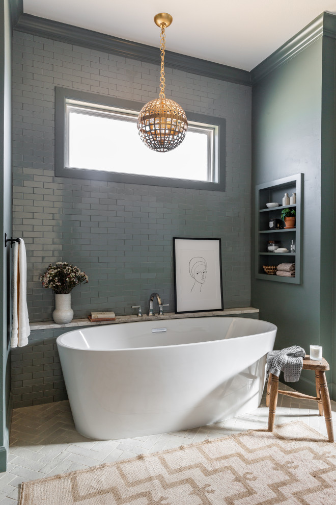 Large transitional master gray tile and ceramic tile brick floor and beige floor freestanding bathtub photo in Dallas with gray walls and a niche