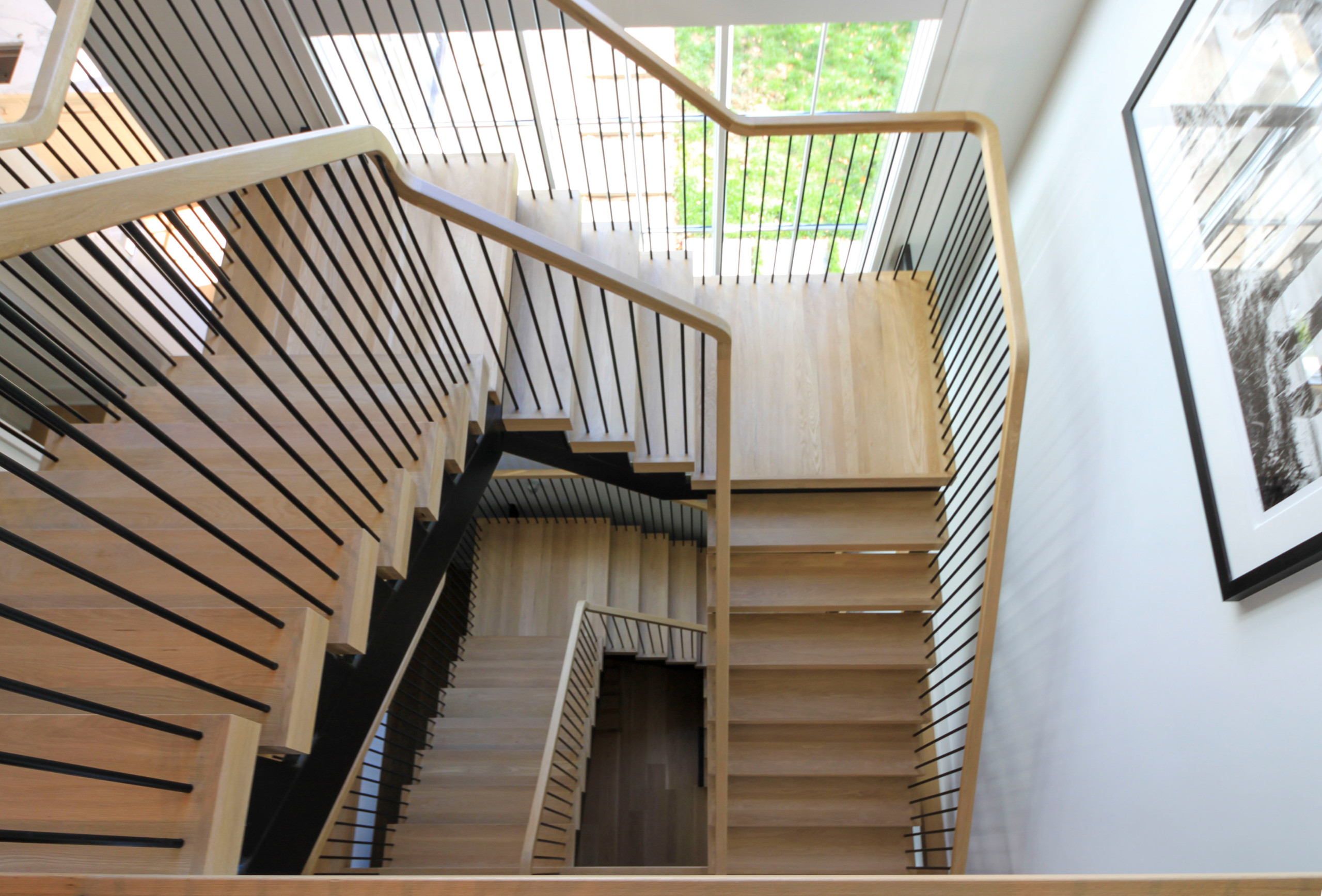96_Dramatic cantilevered no-riser staircase, Bethesda, MD 20814