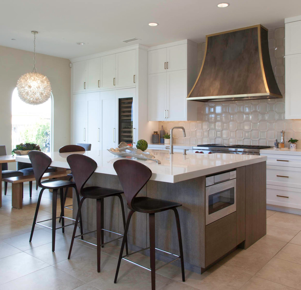 Open concept kitchen - large transitional l-shaped open concept kitchen idea in Denver with shaker cabinets, white cabinets and an island