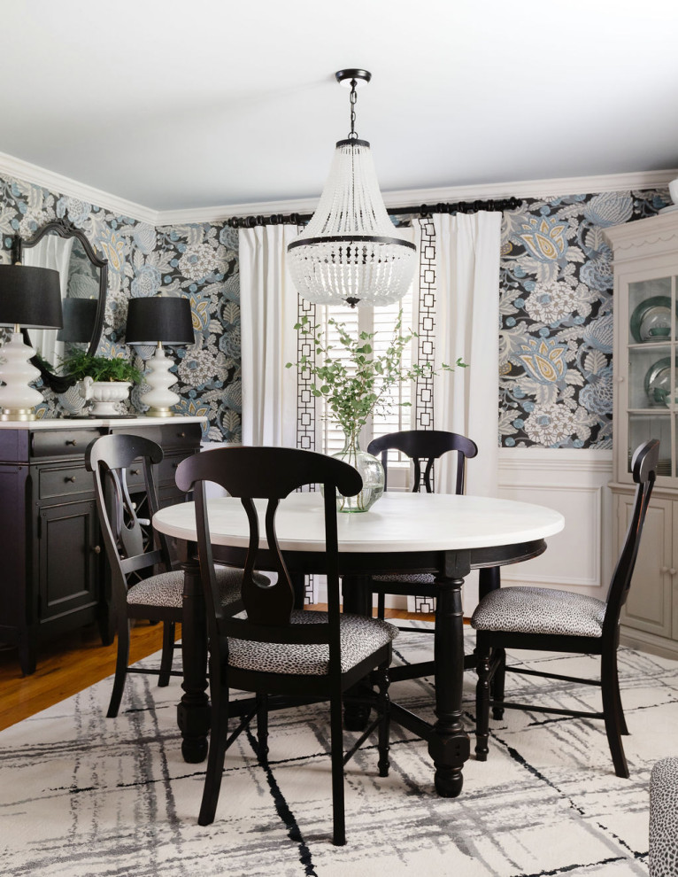 Small transitional separate dining room in Boston with wallpaper, panelled walls, decorative wall panelling, multi-coloured walls, medium hardwood floors, no fireplace and brown floor.