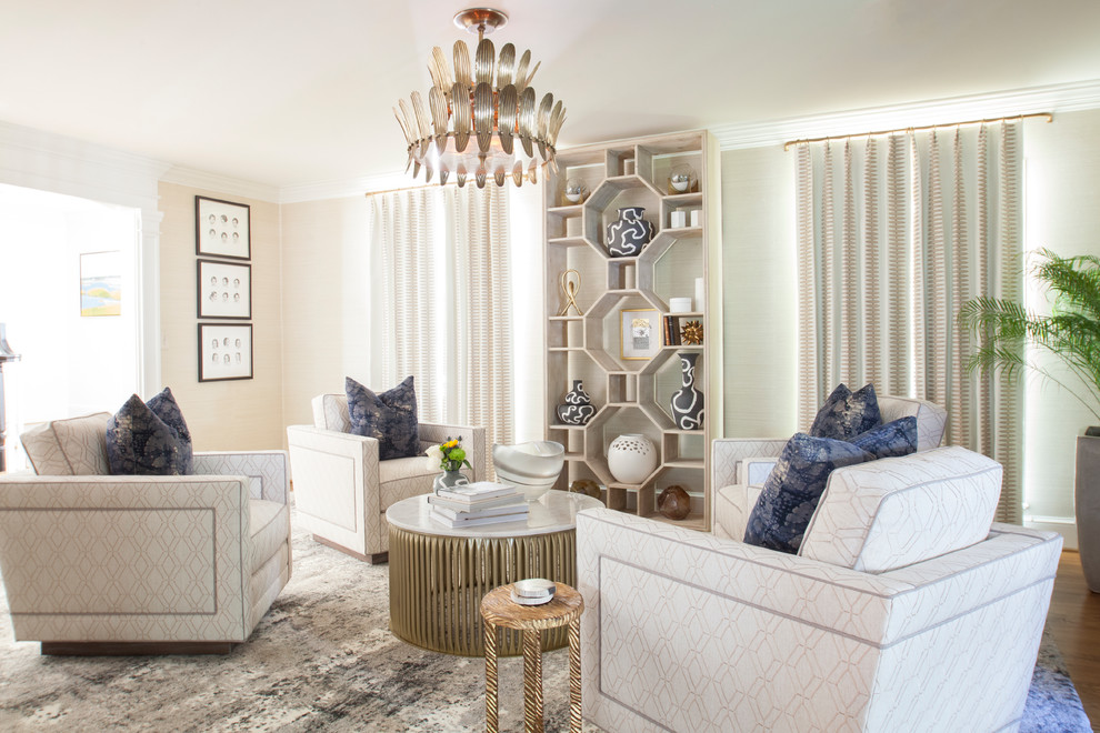 This is an example of a transitional living room in Charlotte with brown floor, beige walls and dark hardwood floors.