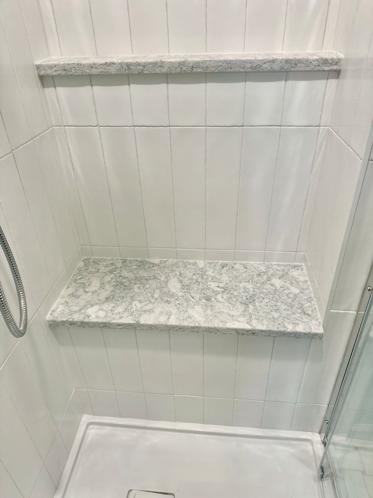 Inspiration for a small transitional 3/4 white tile marble floor, gray floor and single-sink corner shower remodel in Boston with gray cabinets, a two-piece toilet, quartz countertops, white countertops and a built-in vanity
