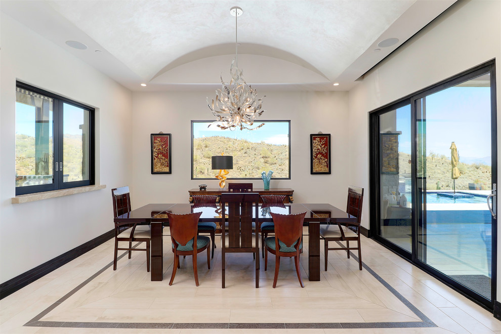 This is an example of a transitional dining room in Phoenix.