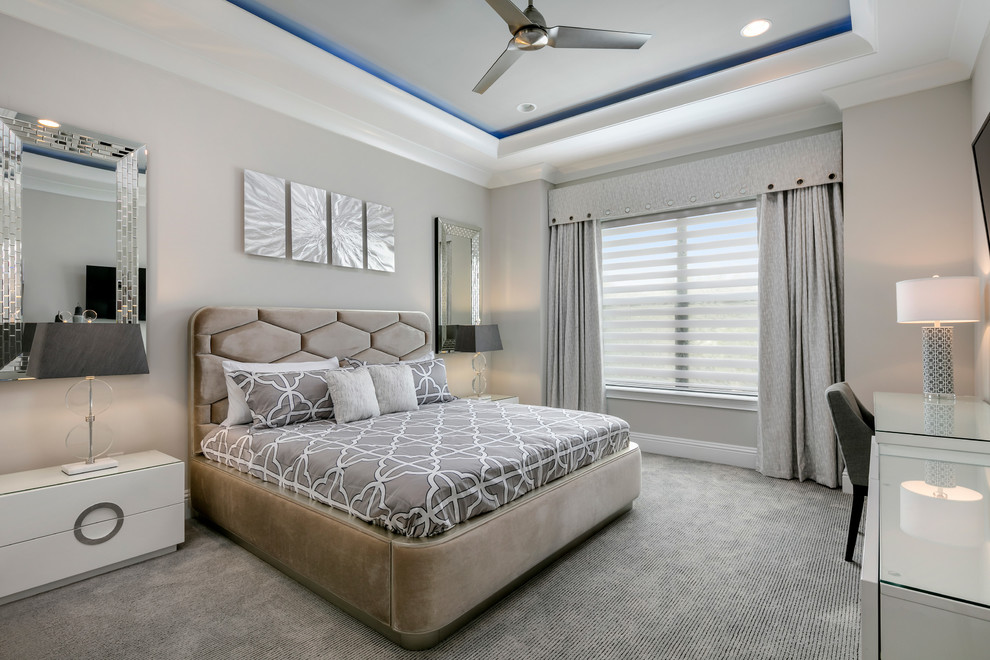 Inspiration for a large contemporary master bedroom in Orlando with grey walls, carpet and no fireplace.