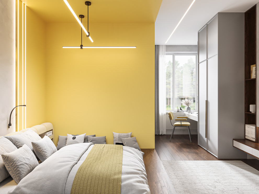 Ispirazione per una camera da letto minimal di medie dimensioni con pareti gialle e pavimento in legno massello medio