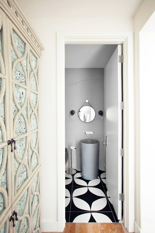 Photo of a modern powder room in Miami.