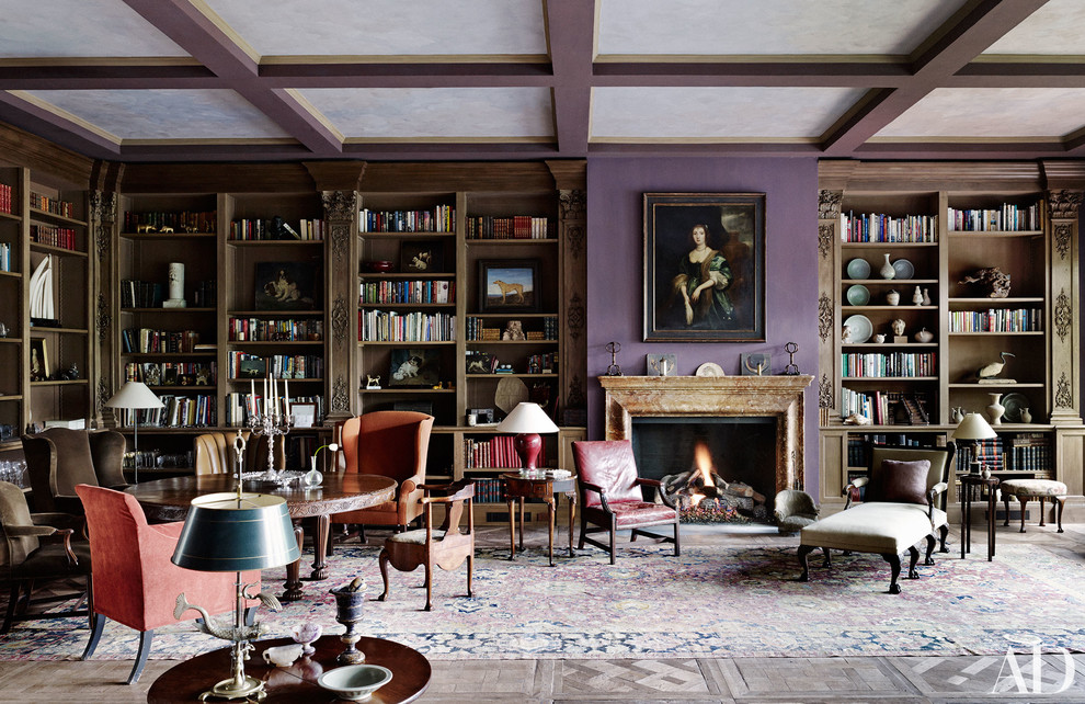 This is an example of a mid-sized eclectic enclosed living room in New York with purple walls and a standard fireplace.