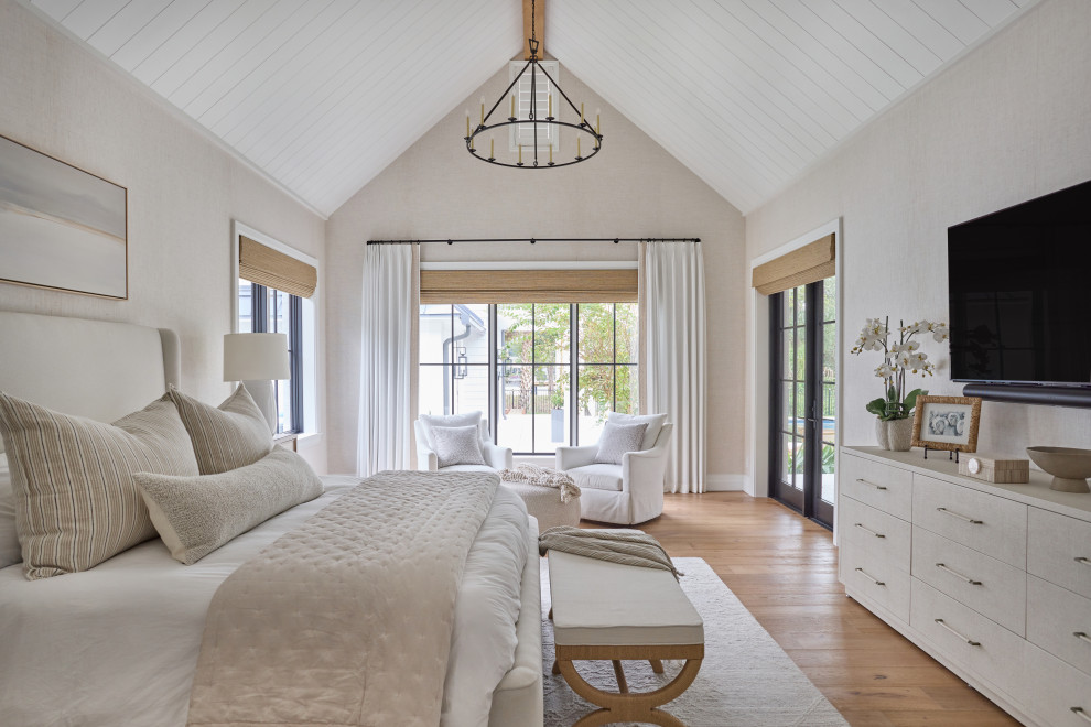 2 Chicks Happy Family Home - Primary Bedroom with Vaulted Shiplap Ceiling and Sitting Area. A serene primary bedroom in a Ponte Vedra Beach custom home by 2 Chicks Design Co. A vaulted white shiplap ceiling, a tailored upholstered bed, a quiet sitting area, and a layered neutral palette create a calm coastal retreat designed for rest and ease. Netural grasscloth wallpaper adds warmth and texture to the tall walls in the space.
Tags: Beach Style, Transitional, Primary Bedroom, Master Bedroom, Vaulted Ceiling, Shiplap Ceiling, Sitting Area