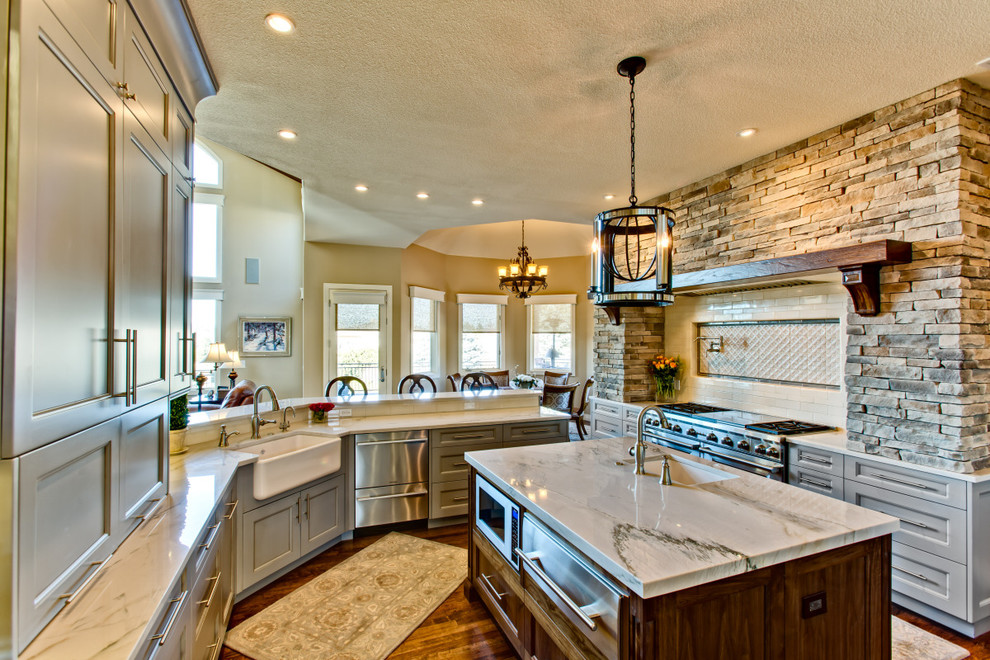 Example of a transitional kitchen design in Denver