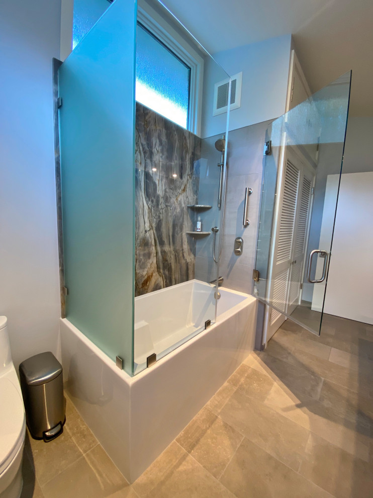 Design ideas for a medium sized eclectic shower room bathroom in San Francisco with flat-panel cabinets, medium wood cabinets, an alcove bath, a shower/bath combination, grey tiles, stone slabs, a submerged sink, granite worktops, grey floors, a hinged door, multi-coloured worktops, a single sink, a built in vanity unit and a vaulted ceiling.