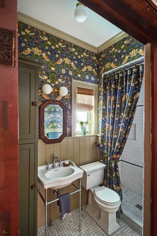 Photo of a small eclectic 3/4 bathroom in Chicago with an alcove shower, a one-piece toilet, white tile, subway tile, multi-coloured walls, mosaic tile floors, a console sink, white floor, a shower curtain, a niche, a single vanity, planked wall panelling, white benchtops and a freestanding vanity.