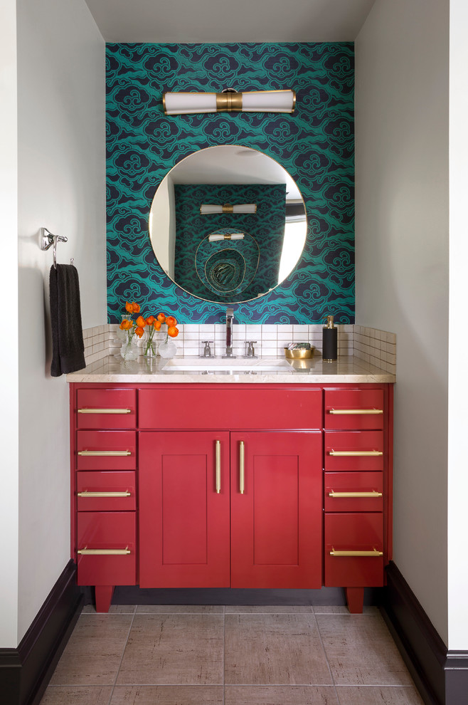 Design ideas for a mid-sized transitional master bathroom in Denver with red cabinets, porcelain floors, an undermount sink, solid surface benchtops, beige benchtops, white tile, multi-coloured walls, beige floor and shaker cabinets.
