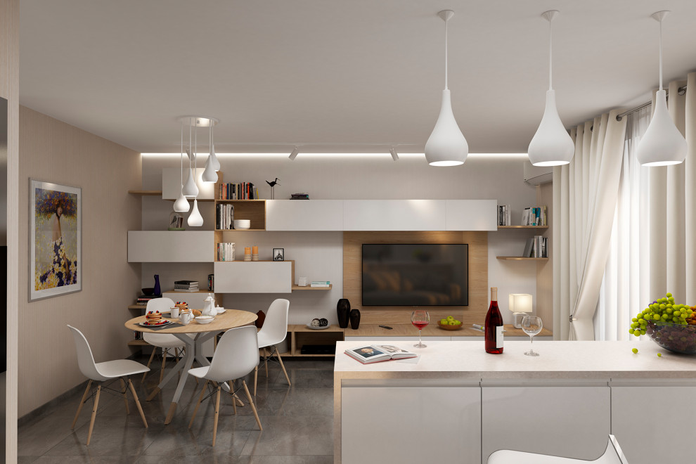 Объединенные в единое пространство кухня, столовая, гостиная.