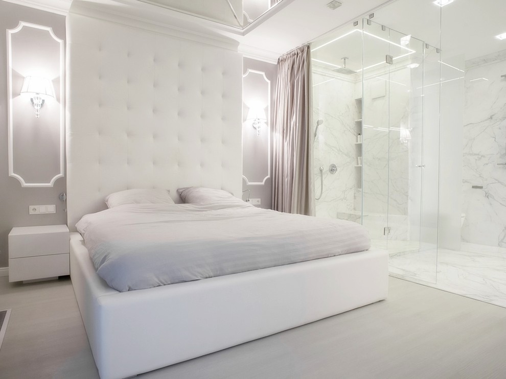 This is an example of a contemporary master bedroom in Other with grey walls.